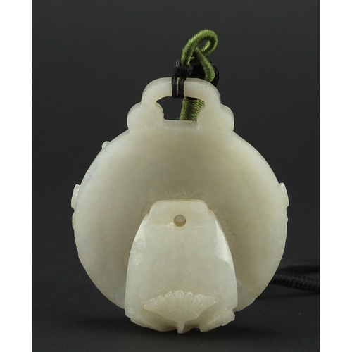 490 - Chinese white jade belt hook, finely carved with flowers, 6cm high