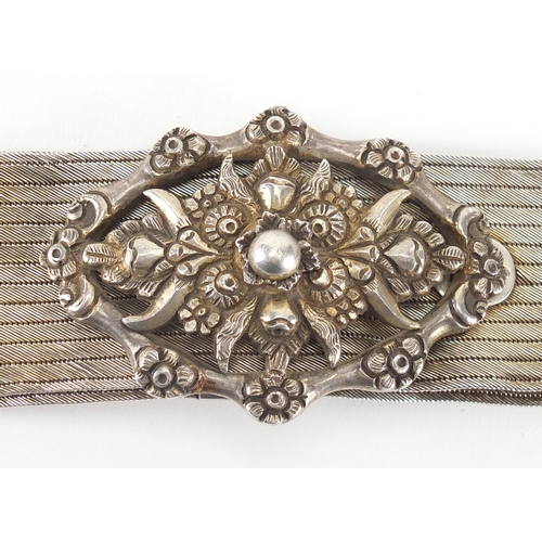 512 - Islamic silver gilt wedding belt, with foliate buckle engraved with floral chased decoration, 88cm i... 