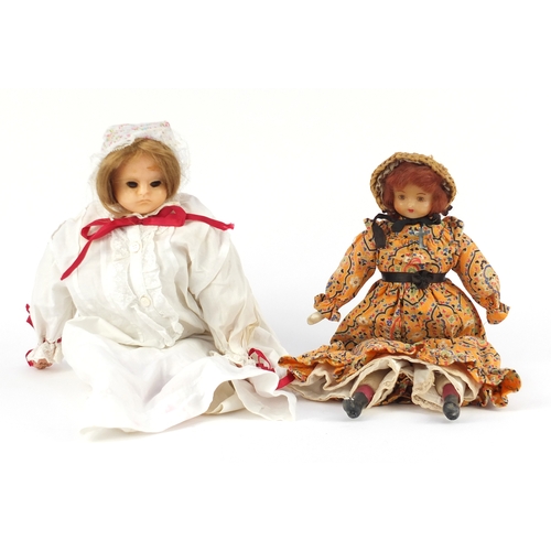 165 - Two wax headed dolls, the largest 40cm in length