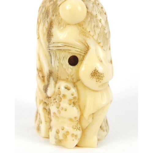 482 - Good Japanese carved ivory netsuke of a man seated on a rock, 5.2cm high