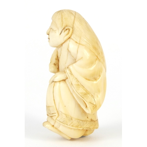 483 - Japanese carved ivory netsuke of a figure in a robe, 4.5cm high