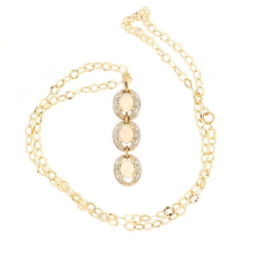 857 - 9ct gold cabochon opal and diamond pendant on a 9ct gold necklace, the pendant 4.5cm in length, 6.8g
