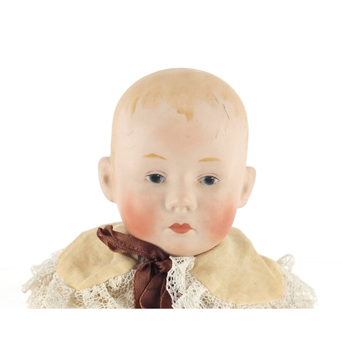 168 - German bisque headed doll of a boy, 35cm in length