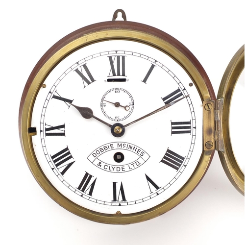 2117 - Brass ships bulk head clock, the enamelled dial with Roman numerals inscribed Dobbie Mcinnes and Cly... 
