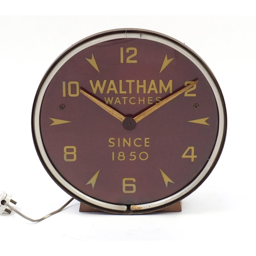 2145 - Waltham Watches advertising electric clock with illuminated bar and Arabic numerals, 40.5cm in diame... 