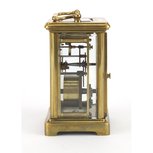 2354 - French brass cased carriage clock with enamelled dial and Roan numerals, 11cm high