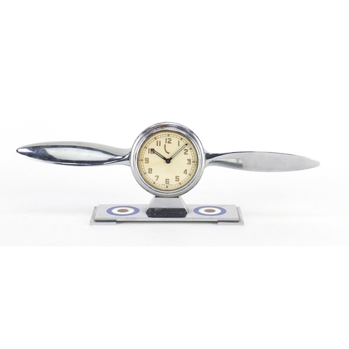 2217 - Military interest chrome eight day desk clock in the form of a propeller, impressed Regd no.823435, ... 