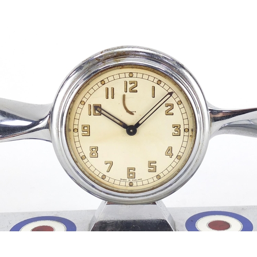 2217 - Military interest chrome eight day desk clock in the form of a propeller, impressed Regd no.823435, ... 