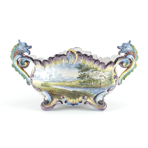 2100A - Italian Majolica centre piece with twin dragon handles, possibly by Angelo Minghetti, hand painted w... 