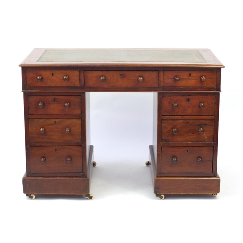 9 - Victorian mahogany twin pedestal desk with tooled green leather insert and nine drawers, 75cm H x 10... 
