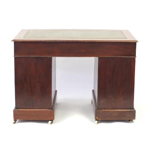 9 - Victorian mahogany twin pedestal desk with tooled green leather insert and nine drawers, 75cm H x 10... 