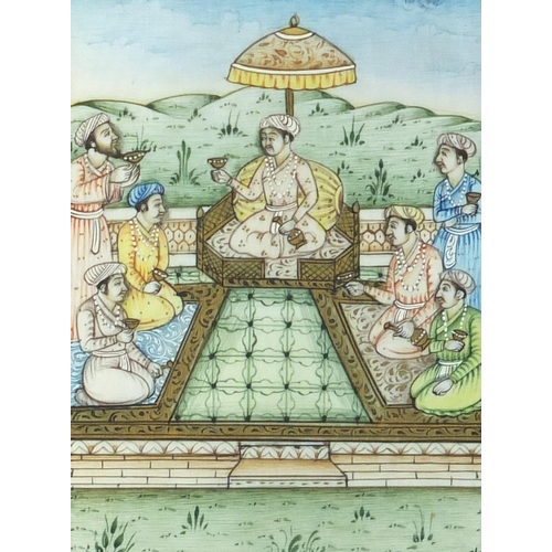 115 - Indian Mughal school panel depicting figures drinking wine, mounted and framed, 10.5cm x 8cm