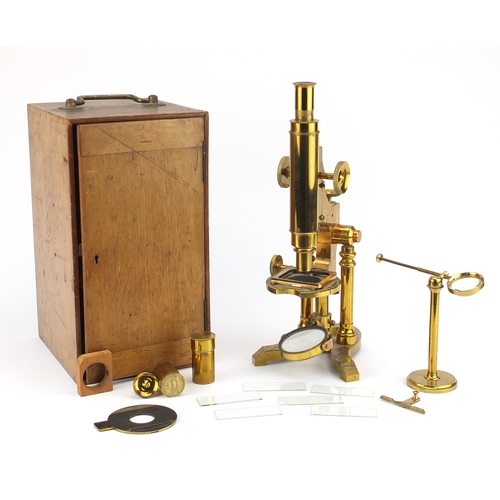 18 - 19th century brass microscope by Ross of London, numbered 5219 with lenses and fitted mahogany case