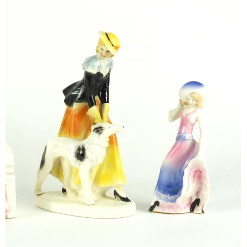 119 - Five Art Deco porcelain figurines including Katzhutte, 32cm wide