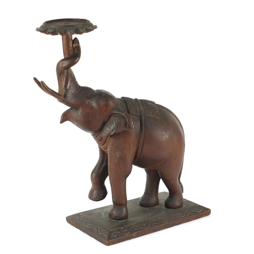 82 - Carved teak Indian elephant, 47cm high