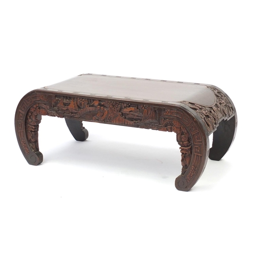 36 - Chinese hardwood coffee table, carved with junks and dragons, 36cm H x 91cm W x 45cm D