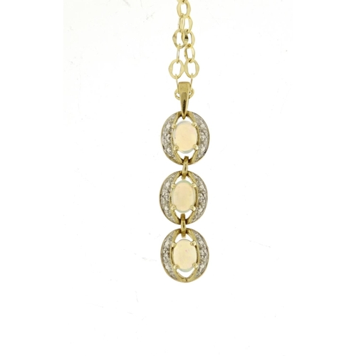 857 - 9ct gold cabochon opal and diamond pendant on a 9ct gold necklace, the pendant 4.5cm in length, 6.8g