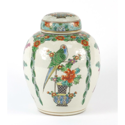 70 - Chinese porcelain jar and cover, hand painted with birds on a branch and berries, 21cm high