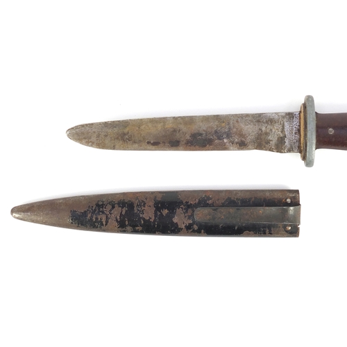 297 - German World War II combat knife with sheath, the steel blade impress Gusstah Puma, 26.5cm in length