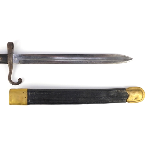 310 - Italian Military interest bayonet with leather scabbard, the steel blade impressed Topre Annunziat, ... 
