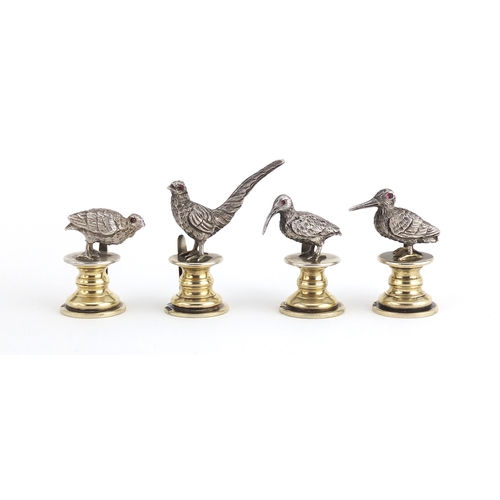 752 - Set of four good quality game bird place card holders including a pheasant and a quail, possibly by ... 