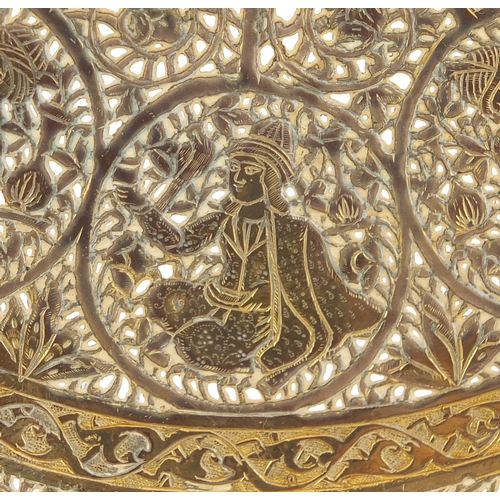 571 - Good Persian gilt copper dish, finely pierced and engraved with figures and flowers, 23cm in diamete... 