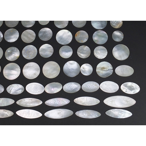 493 - Collection of Chinese Canton mother of pearl gaming counters, some engraved with pagodas, the larges... 