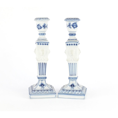 2213 - Pair of Royal Copenhagen porcelain candlesticks with tapering columns and lion masks, each 23cm high