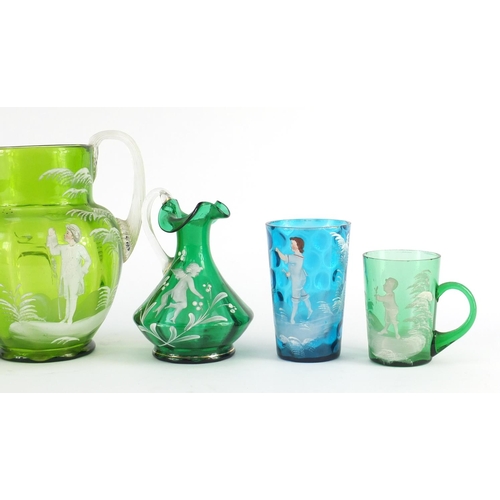 2389 - Victorian Mary Gregory glass including three jugs, the largest 17cm high