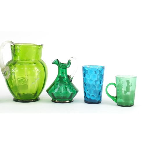 2389 - Victorian Mary Gregory glass including three jugs, the largest 17cm high