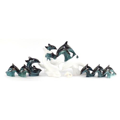 2413 - Poole pottery dolphins including white glazed examples, the largest 23cm high