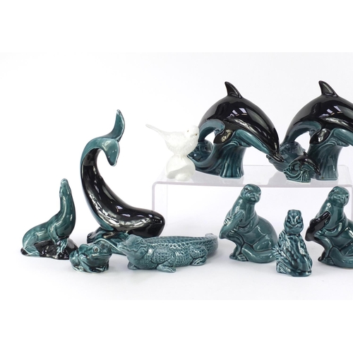 2408 - Poole pottery animals including dolphins, crocodile, duck and otter, the largest 21cm high