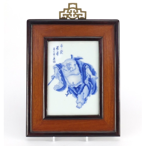 2336 - Chinese porcelain plaque hand painted with a Lohan, with calligraphy, housed in a hardwood frame, th... 