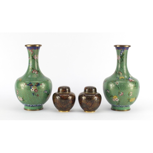 2402 - Pair of Chinese cloisonné vases, enamelled with flowers and a smaller pair of jars and covers, the l... 
