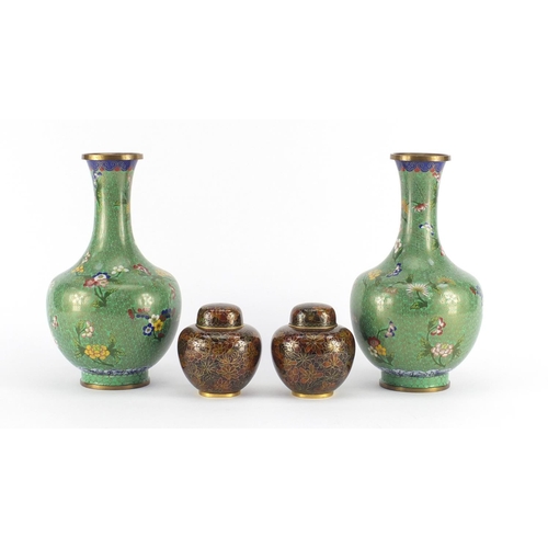 2402 - Pair of Chinese cloisonné vases, enamelled with flowers and a smaller pair of jars and covers, the l... 