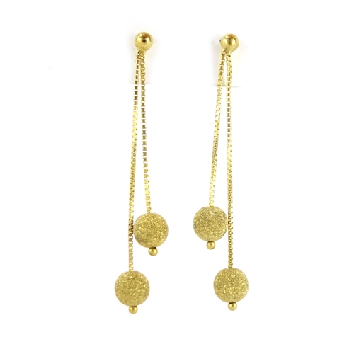 2715 - Pair of 9ct gold dangling ball drop earrings, 5cm long, 2.6g