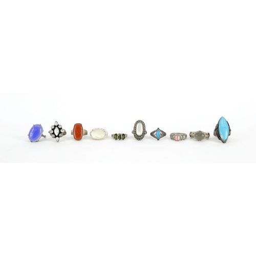 2951 - Ten silver rings, some set with semi precious stones, various sizes, 85.7g
