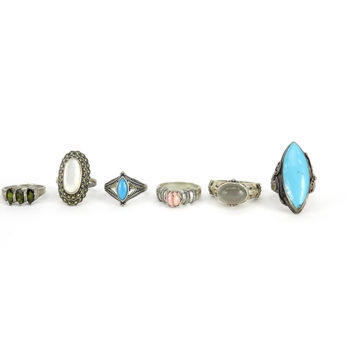 2951 - Ten silver rings, some set with semi precious stones, various sizes, 85.7g