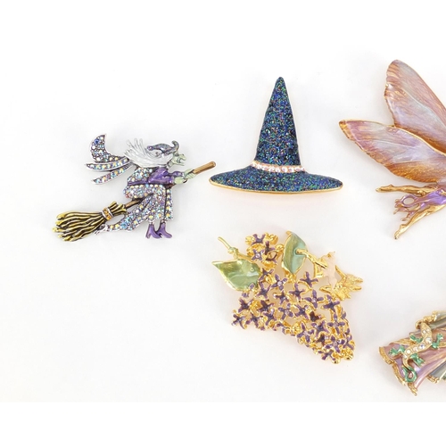 2957 - Six Kirks Folley enamelled brooches including fairies and a witch on a broomstick, the largest 9.5cm... 