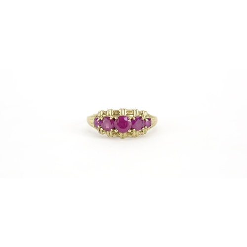 2930 - 9ct gold ruby five stone ring, size S, 3.0g