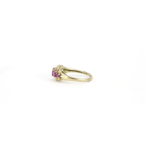 2930 - 9ct gold ruby five stone ring, size S, 3.0g