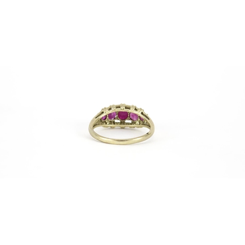 2930 - 9ct gold ruby five stone ring, size S, 3.0g