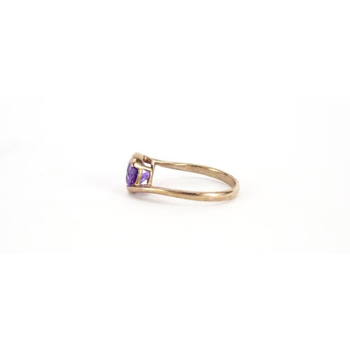 2931 - 9ct rose gold amethyst crossover ring, size T, 3.4g