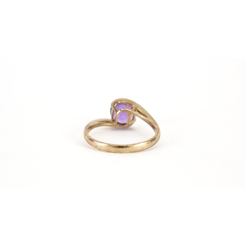 2931 - 9ct rose gold amethyst crossover ring, size T, 3.4g