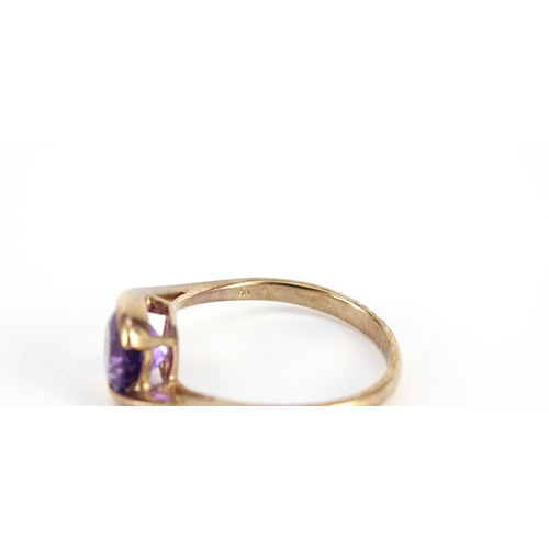 2931 - 9ct rose gold amethyst crossover ring, size T, 3.4g