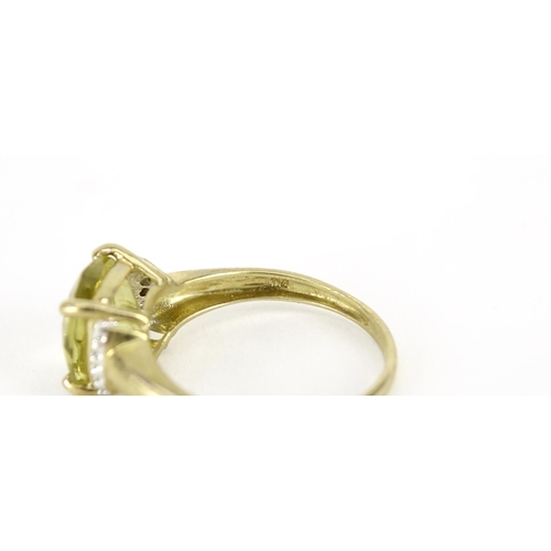 2912 - 9ct gold citrine and diamond ring, size T, 3.1g