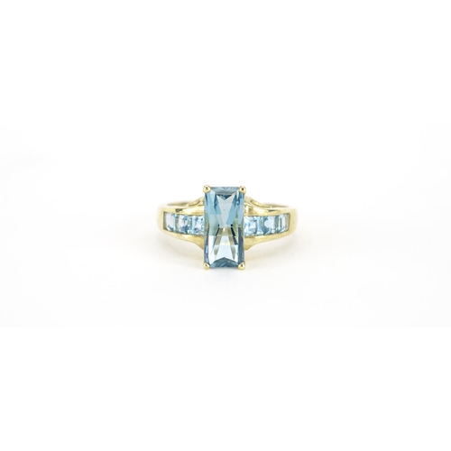 2689 - 9ct gold blue stone ring, size T, 4.9g