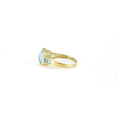 2689 - 9ct gold blue stone ring, size T, 4.9g