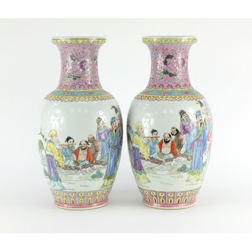 2317 - Pair of Chinese porcelain vases, each finely hand painted in the famille rose palette with figures a... 