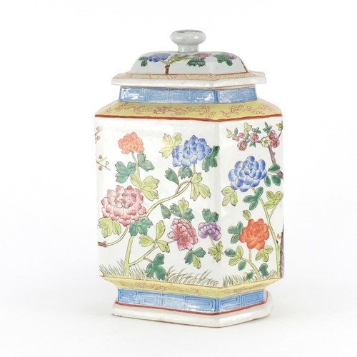2310 - Chinese hexagonal vase and cover, hand painted in the famille rose palette with flowers, 30cm high